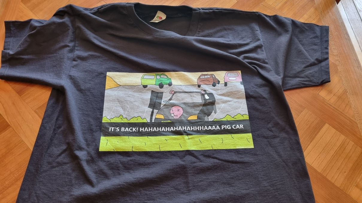 A weird t-shirt about a pig car